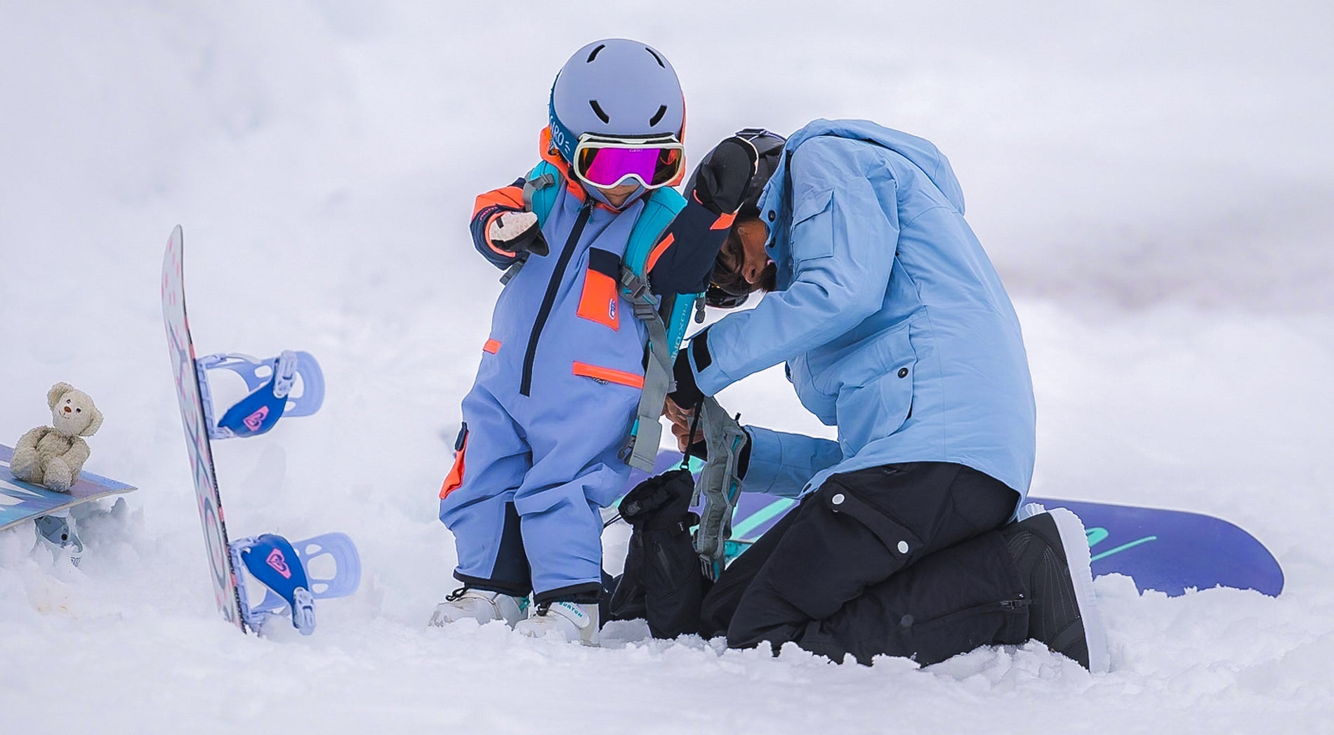 Sascha und seine Tochter beim Snowboarden